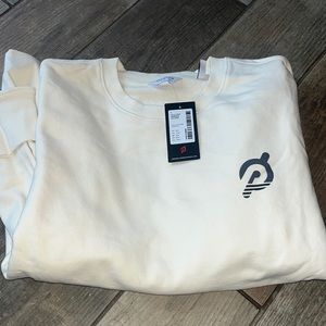 Peloton Studios crewneck NWT size L cream/navy